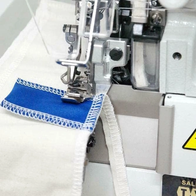 Click to view JUKI MO-6814s Series Serger 4 Thread Sewing Machine with Table and Light